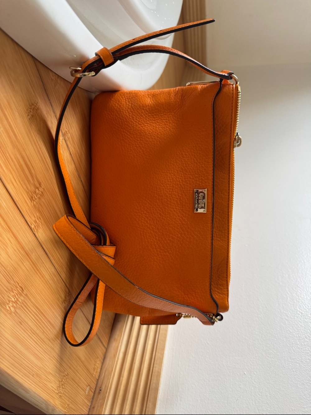 Orange Coach crossbody